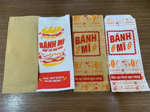 Túi giấy bánh mì in sẵn ( Mix nhiều mẫu) (Giấy FO Trắng và Nâu) (100 cái/xấp - 5.000 cái/thùng) | TÚI GIẤY ĐỰNG THỰC PHẨM | Mã HHTUG005_01_04 | Tổng kho phân phối đồ dùng 1 lần 1lan.vn